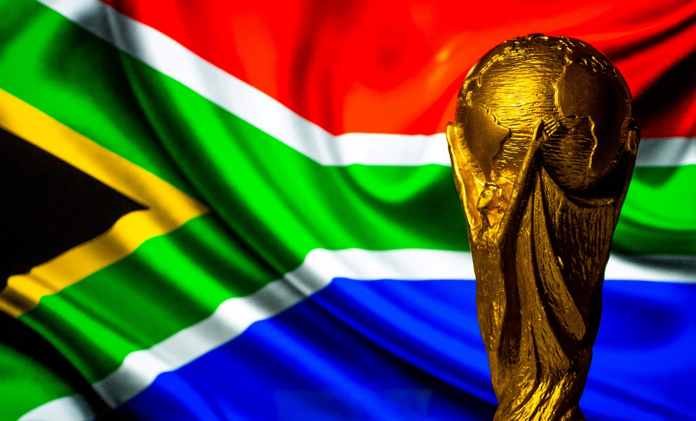 African flag and FIFA trophy